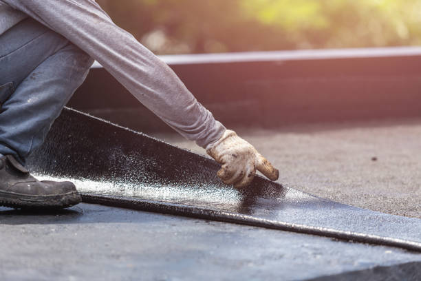 Professional Emergency Waterproofing technician working in Lincoln, ND